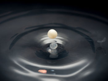 High angle view of illuminated lamp in water