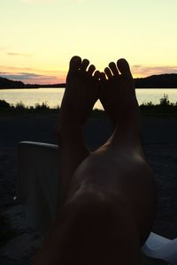 Silhouette of people at sunset