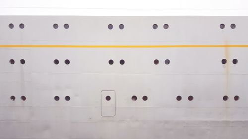 Full frame shot of wall with holes