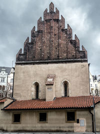 Low angle view of old building against sky