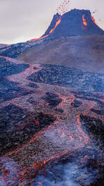 Scenic view of volcanic landscape against sky