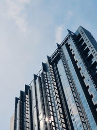 Low angle view of modern buildings against sky