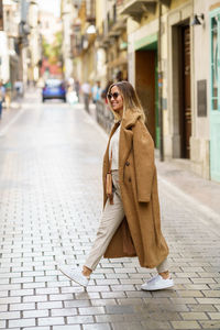 Young woman standing in city