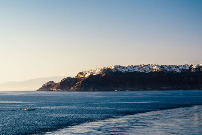 Scenic view of sea against clear sky