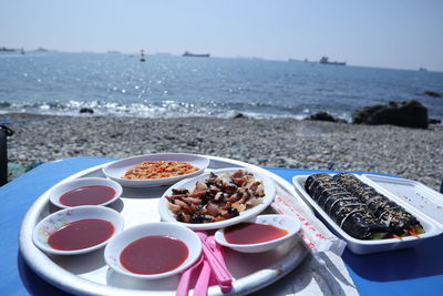 Close-up of food on beach