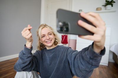 Young woman using mobile phone