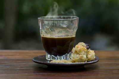 Close-up of coffee cup on table