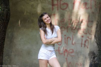 Portrait of teenage girl standing outdoors