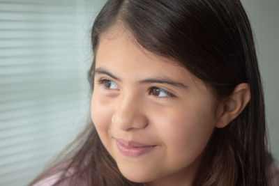 Close-up portrait of a smiling girl