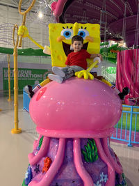 Portrait of boy with toy toys