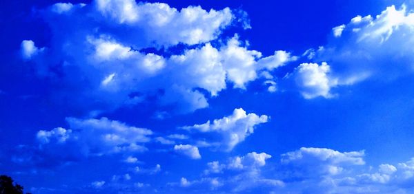 Low angle view of clouds in blue sky