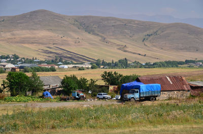 Scenic view of agricultural field against sky