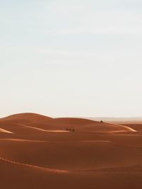 Scenic view of desert against sky