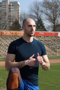 Athlete exercising on field