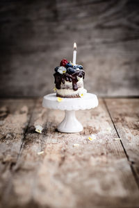 Close-up of ice cream cone on cake