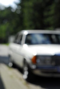 Defocused image of car on road