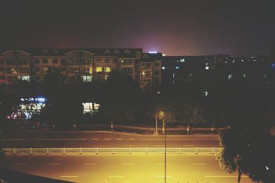 Illuminated street light at night