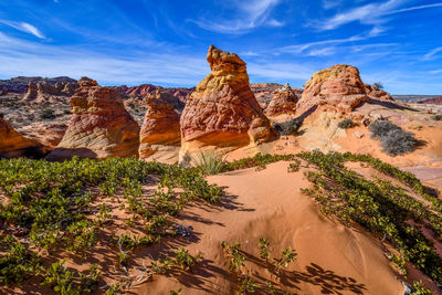 Panoramic view of rock formations against sky