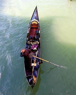 High angle view of people on boat in sea