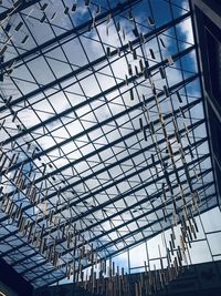 Low angle view of skylight in glass building