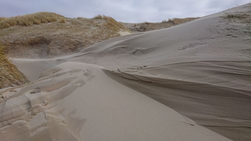 Scenic view of desert against sky