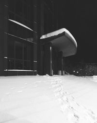 Snow covered landscape at night