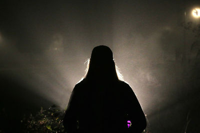 Silhouette people at night