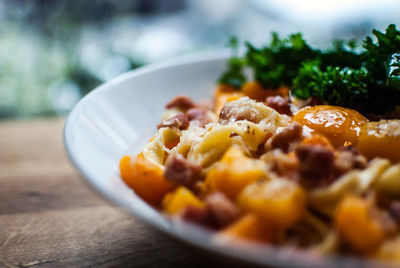 Close-up of food served on table