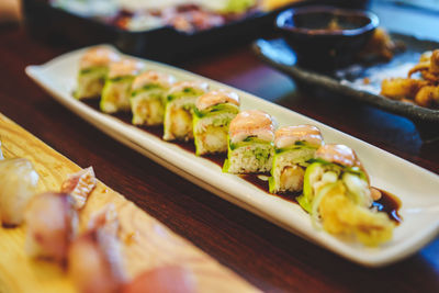 Close-up of sushi served on table