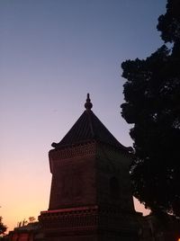 Silhouette of building against clear sky