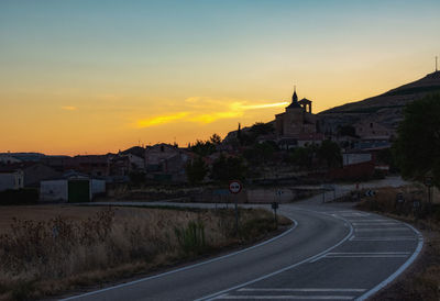 A beautiful view of a farming town at sunsete at sunset