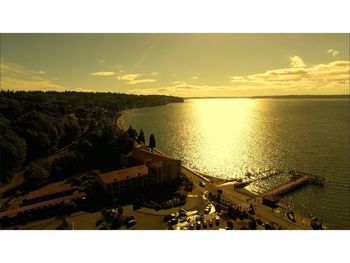 Scenic view of sea against sky at sunset