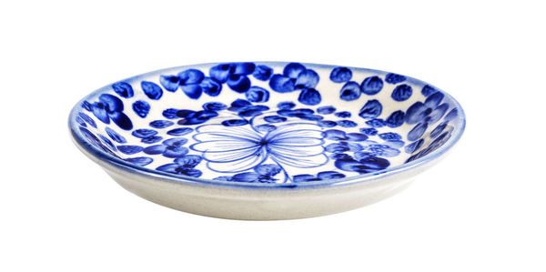 High angle view of blue bowl on white background