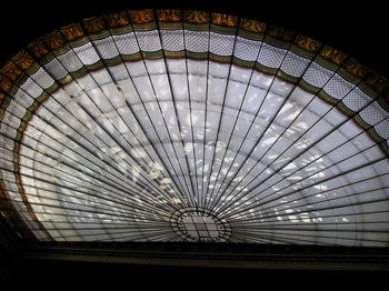Low angle view of illuminated ceiling