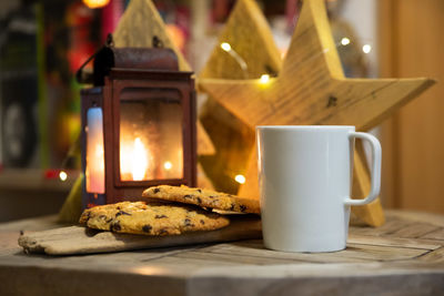 Close-up of coffee cup on table