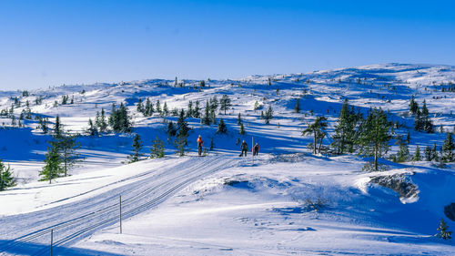 Panoramic view of ski lift against clear sky