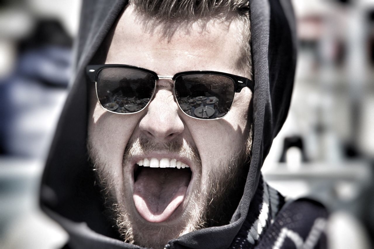 close-up, focus on foreground, headshot, portrait, looking at camera, human face, front view, sunglasses, lifestyles, part of, leisure activity, beard, day, wearing, young adult, fashion, eyeglasses