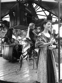 Young woman looking at city street