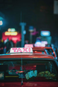 Close-up of taxi on street