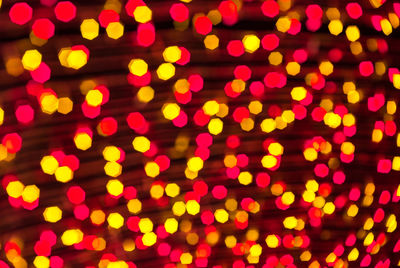 Defocused image of illuminated christmas lights