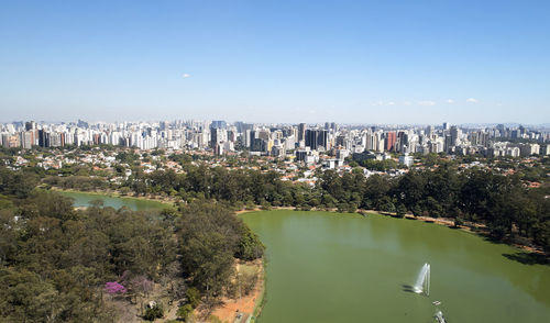 High angle view of buildings against clear sky