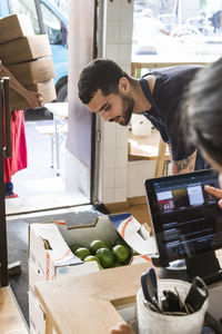 Multi-ethnic colleagues working at restaurant