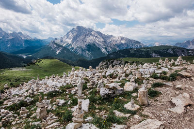 Scenic view of mountains against sky while hiking tre crime di lavaredo