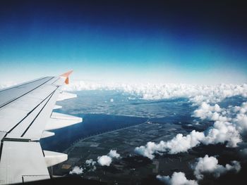 Cropped image of airplane wing