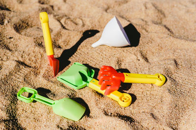 High angle view of toy on sand