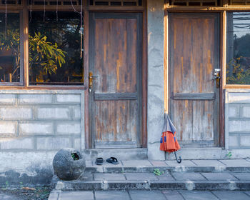 Exterior of house hanging by window