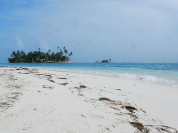 Scenic view of beach against sky