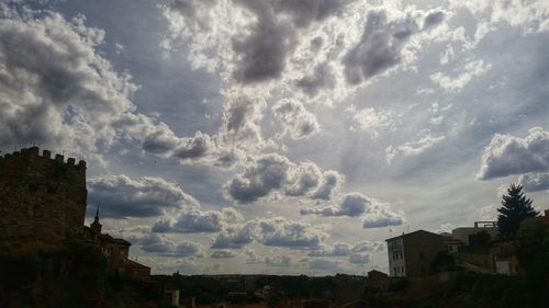 Low angle view of city against sky