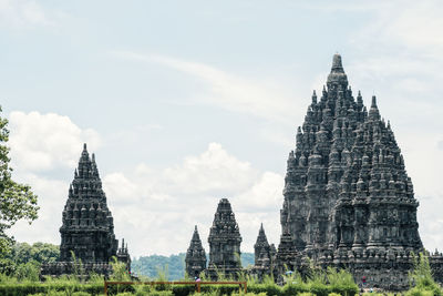 Low angle view of historic temples against sky