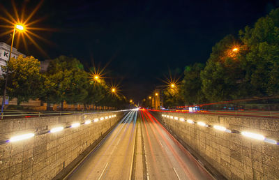 Light trails on road at night